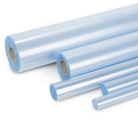 Transparent bokskyddsfolie i olika storlekar bredvid varandra